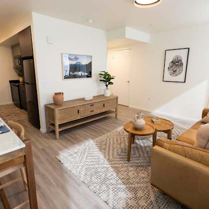 a living room with a couch and a table at moraine, tacoma, washington 98402