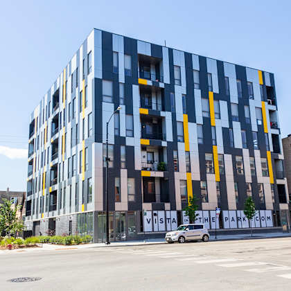 a new apartment building on the corner of a city street at talman 1554, chicago, 60622