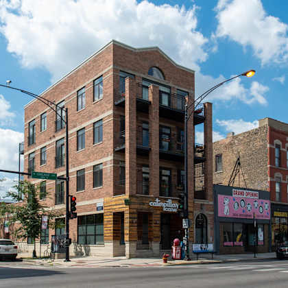 a brick building on the corner of a city street at west chicago 1701, illinois