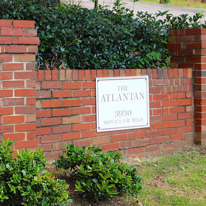 a brick wall with a sign for the atlantic on it