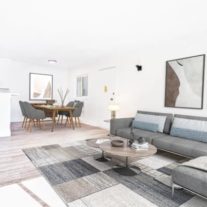 a living room with a couch and a table