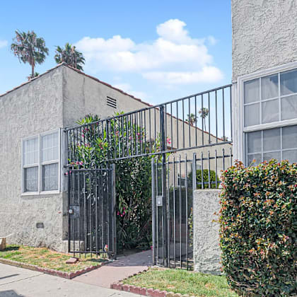 a street view of a building with a sign that reads "pattison st".