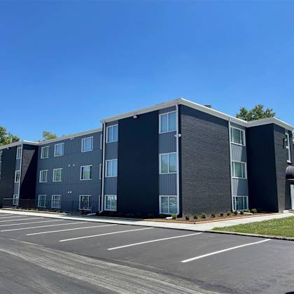 a building with a parking lot