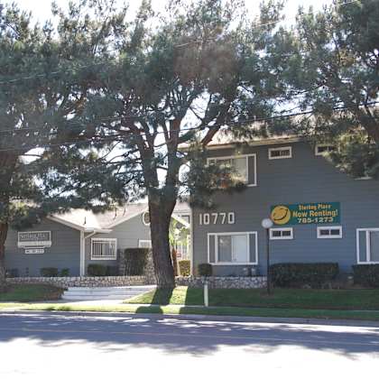 apartment complex with a sign that says