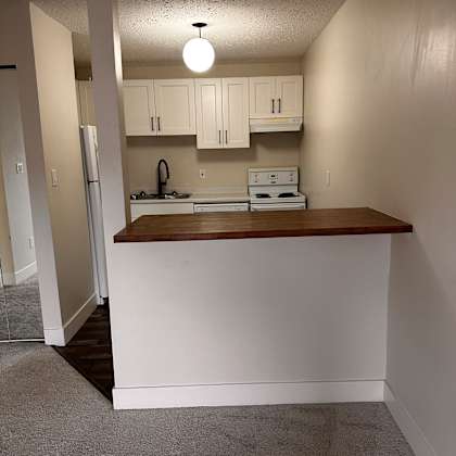 a bathroom with a sink and a mirror.