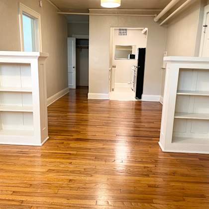 original hardwood floors throughout.  built-in banquet bookshelves..