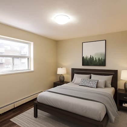 a bedroom with a large bed and a painting on the wall.