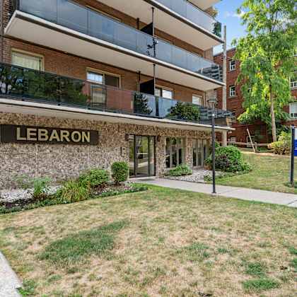 the image shows a building with the word "lebaron" on it.
