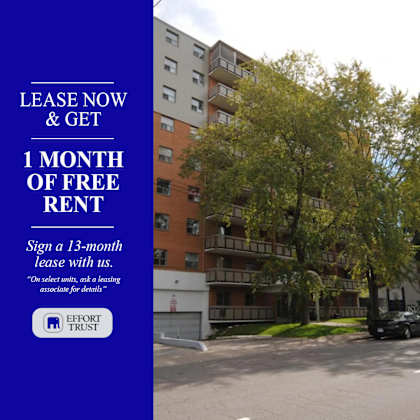 a blue sign offering a free month of rent for signing a 13-month lease.