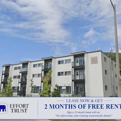 a building with a sign offering 2 months of free rent.