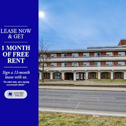 a blue and white advertisement for a 1 month free rent offer.