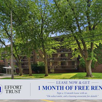 a sign advertising a free month of rent at effort trust.