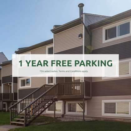 a building with a sign offering 1 year free parking.