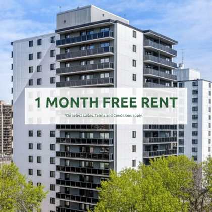 a tall white building with a sign that says "1 month free rent" in front of it.