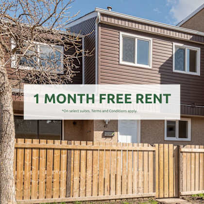 a sign offering a free one month rent on a house.