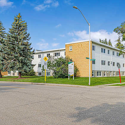 a yellow building with a sign that says 30 on it.