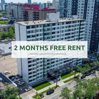 a large white building with the text "2 months free rent" in the foreground.