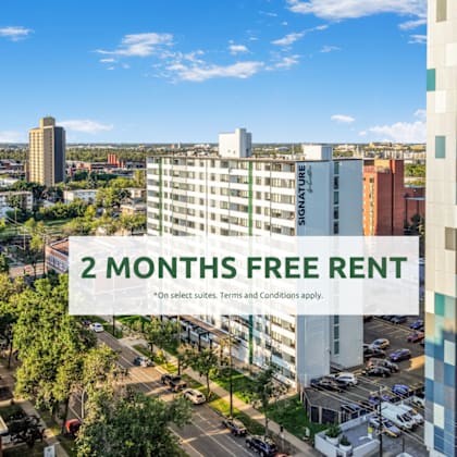 a cityscape with a building offering 2 months free rent.