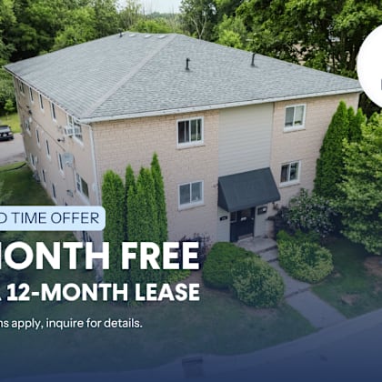 a building with a sign that says "pier 4 business" and "1 month free on a 12-month lease".