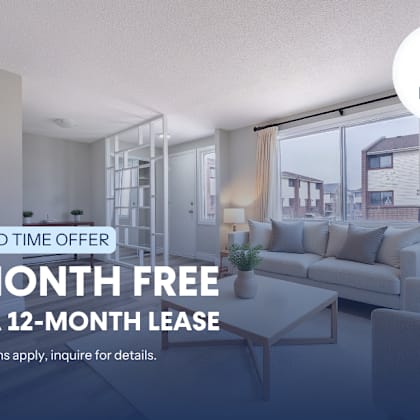 a living room with a 1 month free offer on a 12-month lease.