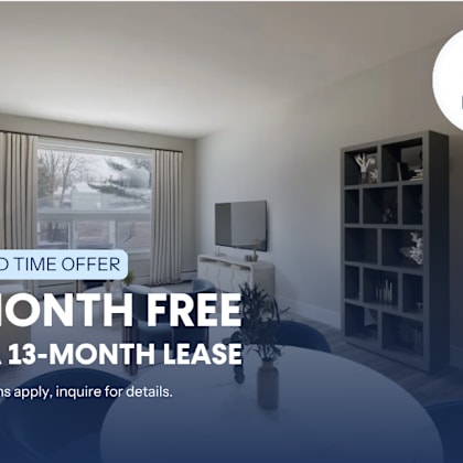 a room with a large window and a flat screen tv is on display for a limited time offer.