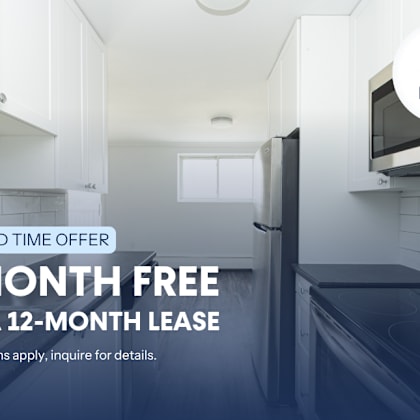 a kitchen with a sign offering a free month on a 12-month lease.