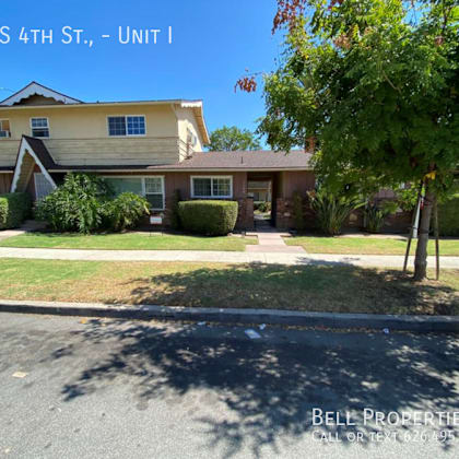 a house with the text 1508 s 4th st., - unit i on it.
