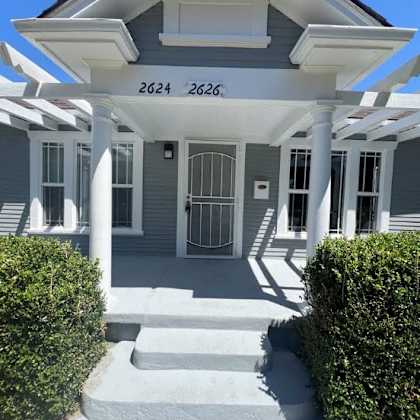 a house with the numbers 2624 and 2626 on the front.