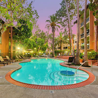 the swimming pool at night at the apartments for rent at casa granada, los angeles, 90049