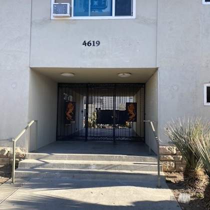 the image shows the front of a building with the number 4619 on it.