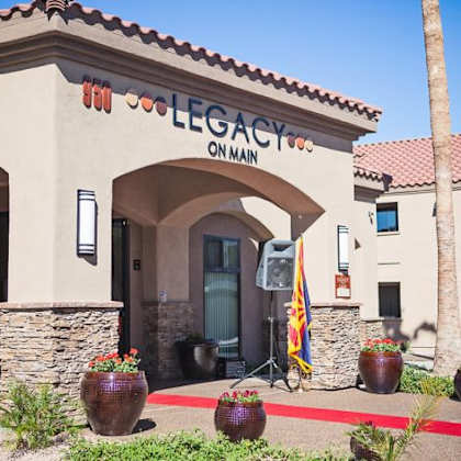 the legacy on main building has a red carpet entrance.