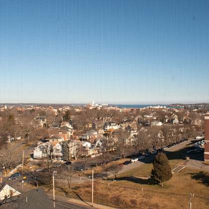 a view of the city from the top of a building