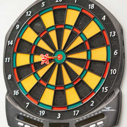 a dart board with sixteen darts in the center