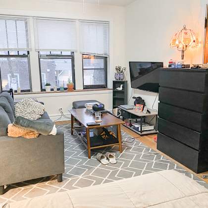 a living room with a couch and a tv