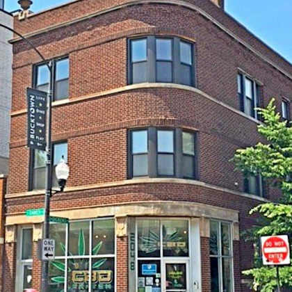 a building on the corner of a city street