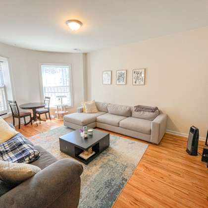 a living room with a couch and a coffee table