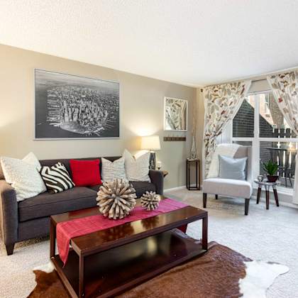 a living room with a couch and a coffee table