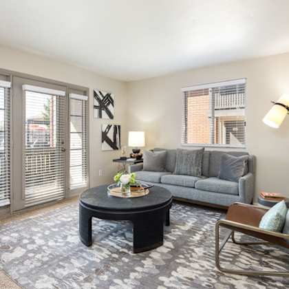 a living room with a couch and a coffee table