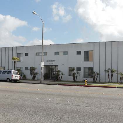 a white building with the name "maple hill" on it.