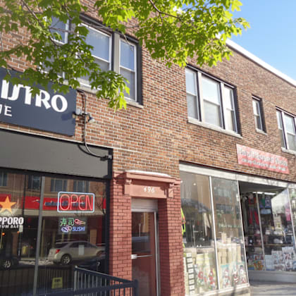 a brick building with a sign that says butro kuisine.