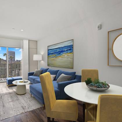 open-concept dining and living room with patio
