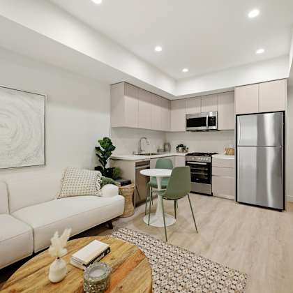 open-concept kitchen, dining, and living room space