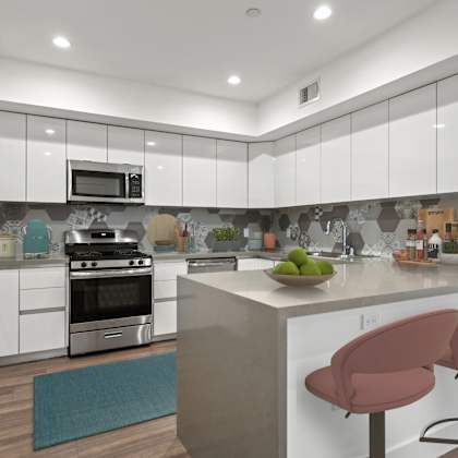 full-size kitchen with energy-efficient appliances and countertop bar