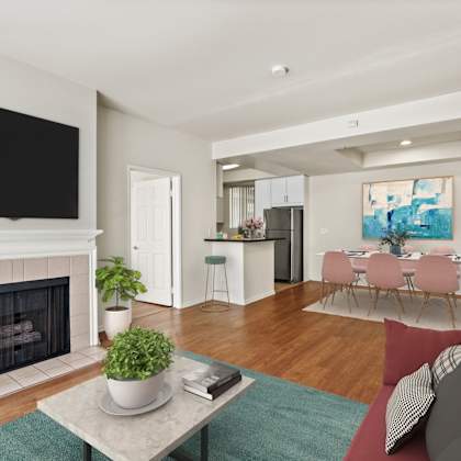 open-concept kitchen, dining, and living room space
