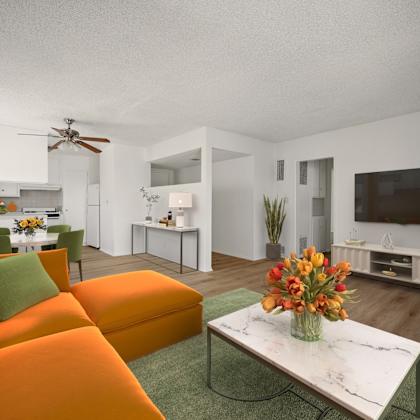 open-concept kitchen, dining, and living room with vinyl flooring