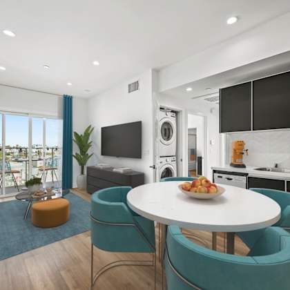 open-concept kitchen, dining, and living room with patio -madison floor plan