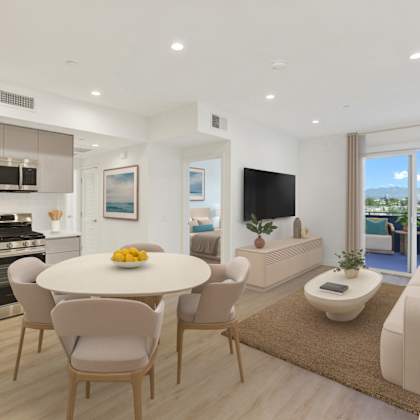 a modern kitchen with a dining table and chairs.