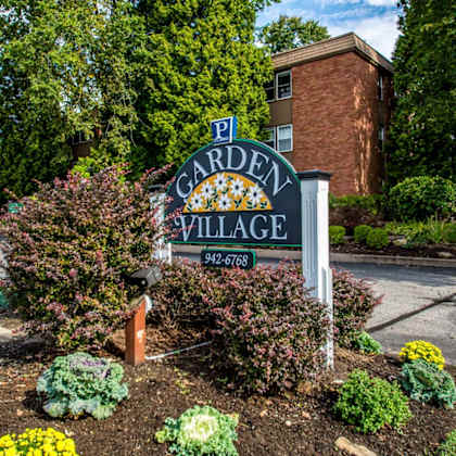 garden village entrance sign