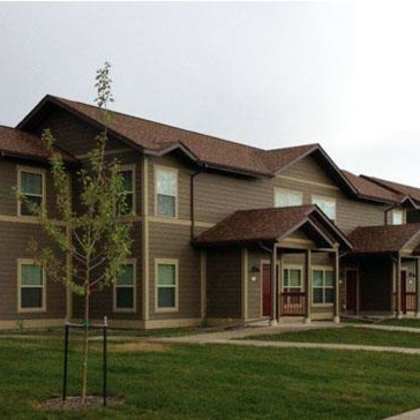 exterior building elevation and lawn