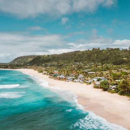an aerial view of a beach and the ocean